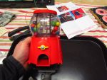 104
Gumball machine rebuilt  with glass  gumballs.The  handle part is also now correctly  mounted and  oriented. 