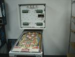 186
       The worn playfield  assembly is dropped back in the game for some quick testing before begining the teardown for the