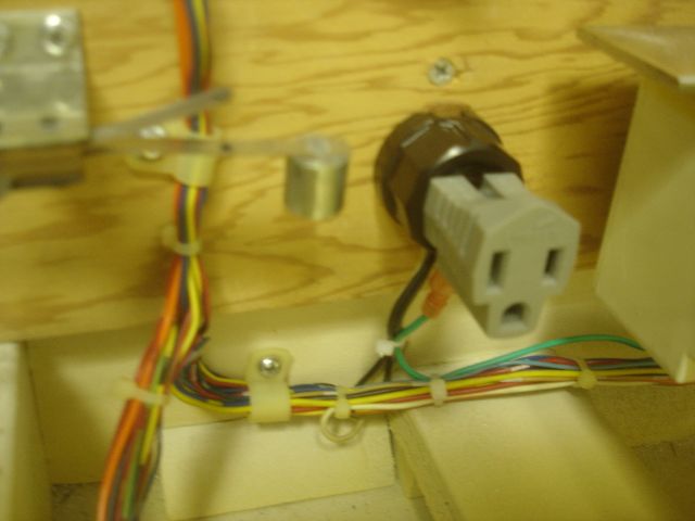 203
      The service outlet has been upgraded to a polarized grounded unit like the power cord.This allows you to plug in mode