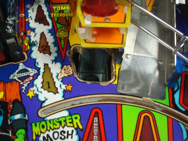 7
 The game although a bit rough looks to be pretty low use.Has the typical wear at the Mosh pit and a little on the drac trac.