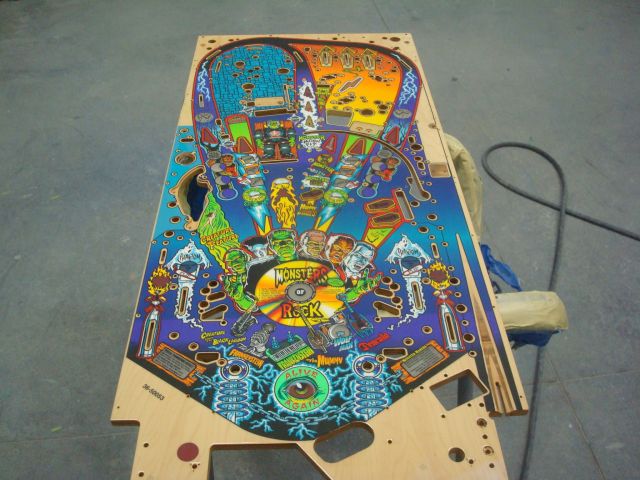 119
 Playfield is sanded .This will smooth in all the repairs and give me a nice surface to do the final repaints and bordering