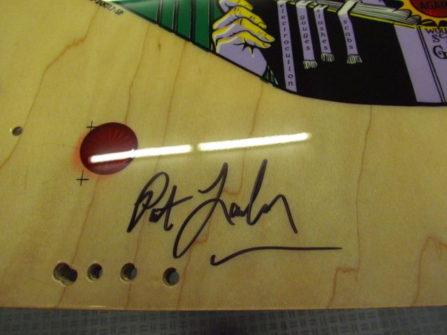 25
The  playfield is  signed by the designer.That  was after the clear so it is  easily  rubbed off.I will clear over it after 