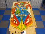 48
 Now that the playfield has had a few months to soak in I will begin the repaints.