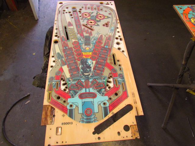 22
Took quite a bit of sanding but the playfield is  shaved down.