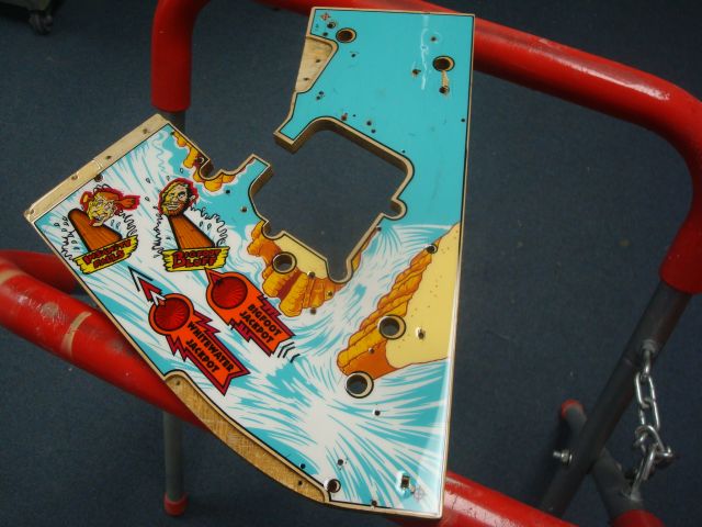 69
 The replacement upper playfield I am using has had an intital coat of clearcoat applied.This will seal it up so I can do th