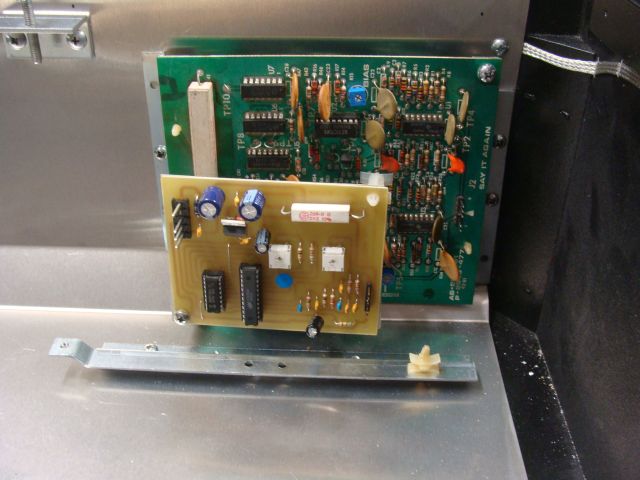 185
 Aftermarket reverb board is now mounted  to the original in a similar position that will keep the wire routing correct and