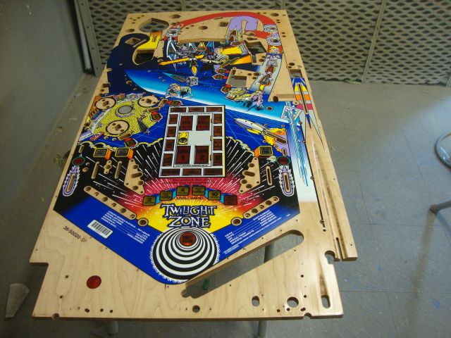 42
 First I  sprayed some adhesion promoter.Since this playfield does not need a lot of repaint I am going to  start painting i
