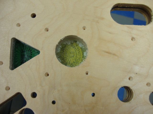 33
 The playfield is dimpled for the  target assembly so that helps a little.