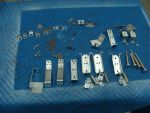 33
 Coil brackets and hardware are prepped for rebuild.