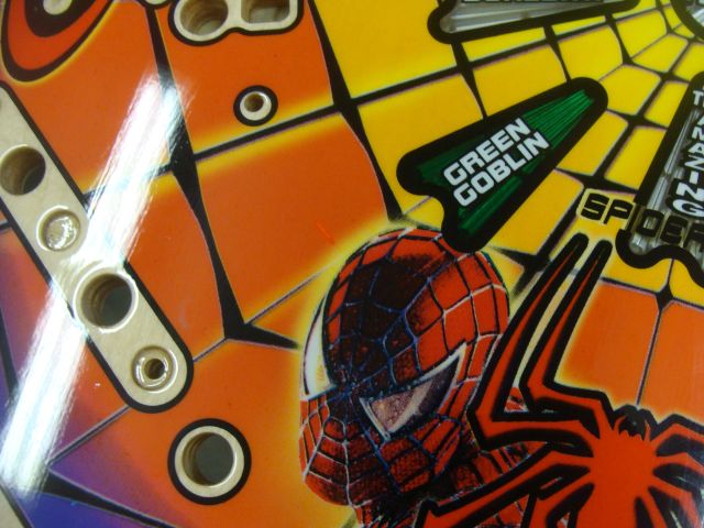4
 Unusual factory "touch up" just to the upper left of Spidermans head.It looks like a think pinkish line but you ha