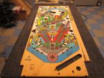 62
After a little extra cure time due to the many applications needed to seal the insert decals the playfield is sanded and rea
