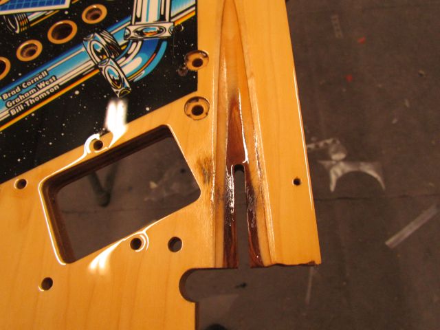 37
Shooter lane needs work but  the clear is  starting to seal the wood fibers that are  splintered from wear.