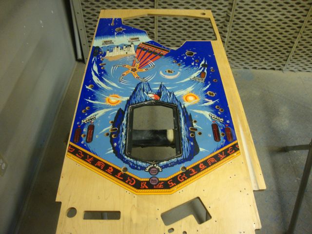 117
 Starting the refinishing process for the main playfield.