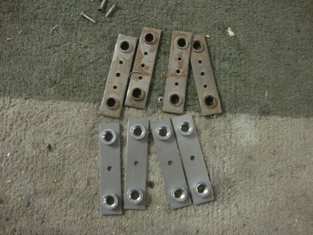 165
  At the top are the original leg plates.Below are the  replacements.They are reinforced and will not strip out like the or