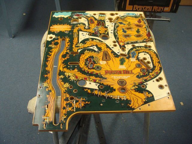 35
 Upper playfield stripped complete.
Mylar removal will be next.