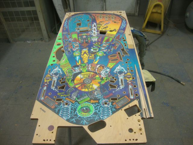 50
 Playfield  will require one more  clear application.
It is sanded.