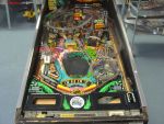 10
 Playfield and  parts are equivalent to the cabinet maybe just a little better....maybe. 