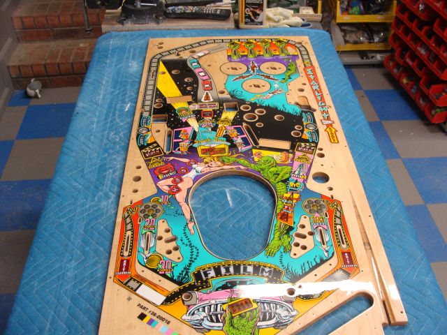 54
 Playfield has been sanded and polished.All parts are in place s rebuild begins.
