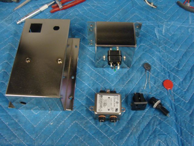 68
 All components needed to rebuild the power box are in place.The  box and receptacle side have been plated. The box will be 