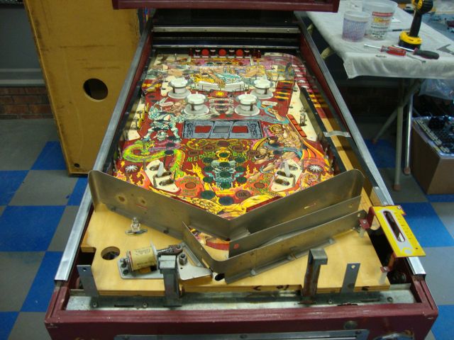 34
 I need to get the old playfield out in order to  template ,drill and dimple the  replacement.  