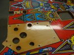 56
 Heavy graining  in the entire playfield.Graining is the  rougher wood texture  showing as wood grain. 