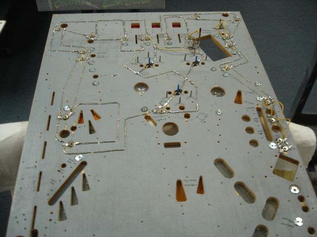 104
  One of the worst part of older game playfield swaps is the stapled GI and socket set up.
