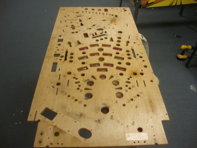 40
 Playfield is out of the cabinet and  stripped bare.