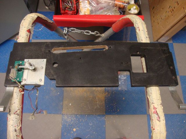 69
Backboard is being modified for the  lost plastic and  lighting. 