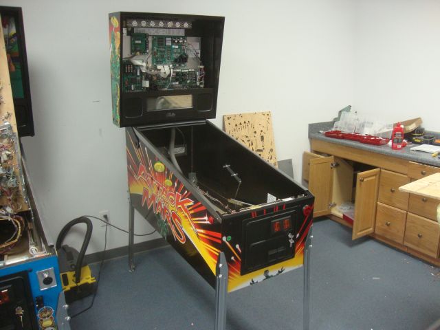76
 Cabinet is fully rebuilt,wired and  up on legs.