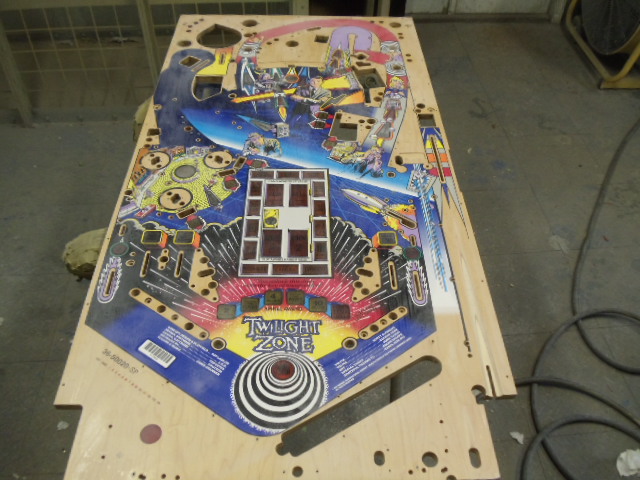 65
Playfield is sanded and  being  prepped for some initial repaints prior to the first clear application.