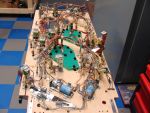 86
 All wiring and mechs are in place.
 A  bit of wire routing/clean up is still needed then the playfield is ready to flip ag