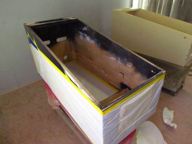 72
Cabinet is  masked to  be  painted inside and  cover the   damage  from the  rail removal.