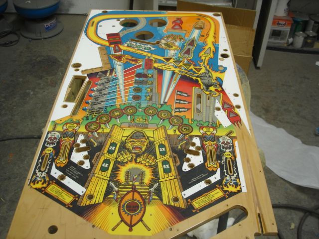 32
 That really seemed to freshen the playfield up a bit.I am going to apply the  second coat of clear now and hopefully once t