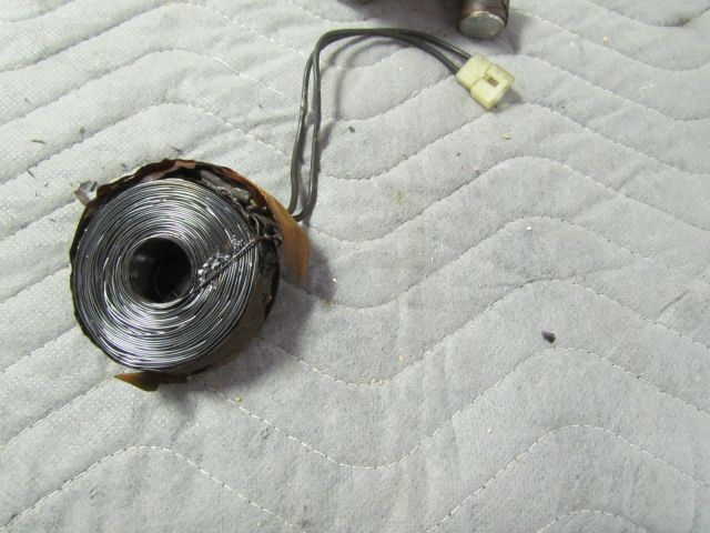 57
Here is the burnt magnet.It will be replaced along with many other if not all coils depending on what else I  find. 