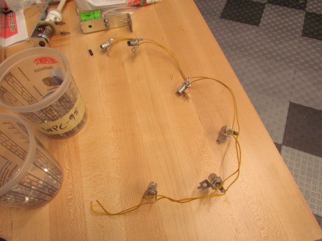 135
Example of what is being removed and replaced.The thin flimsy all yellow wires are being eliminated in favor of more color 
