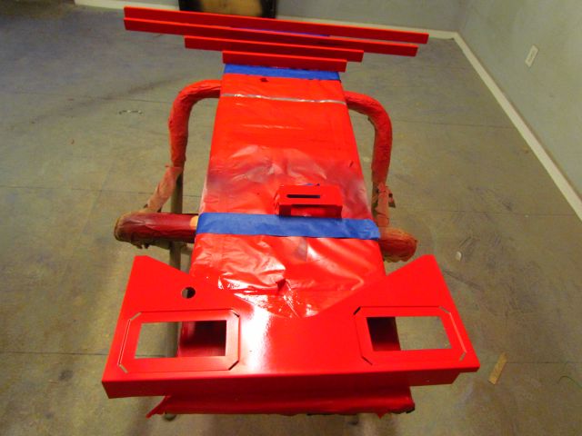 165
Stripped primed,now based in red.Playfield rails are done at the same  time as well.