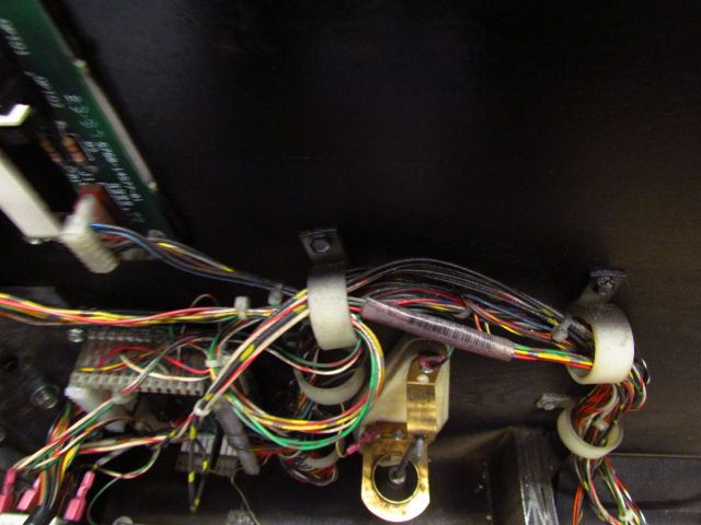 18
Black paint is on much of the wiring and  hardware inside the cabinet.