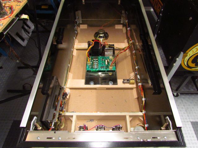 104
The rebuilt parts and  wiring are  neatly  routed and installed in the cabinet.
