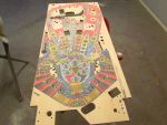 24

Playfield is  sanded as   much as possible without breaking into the art below the surface.